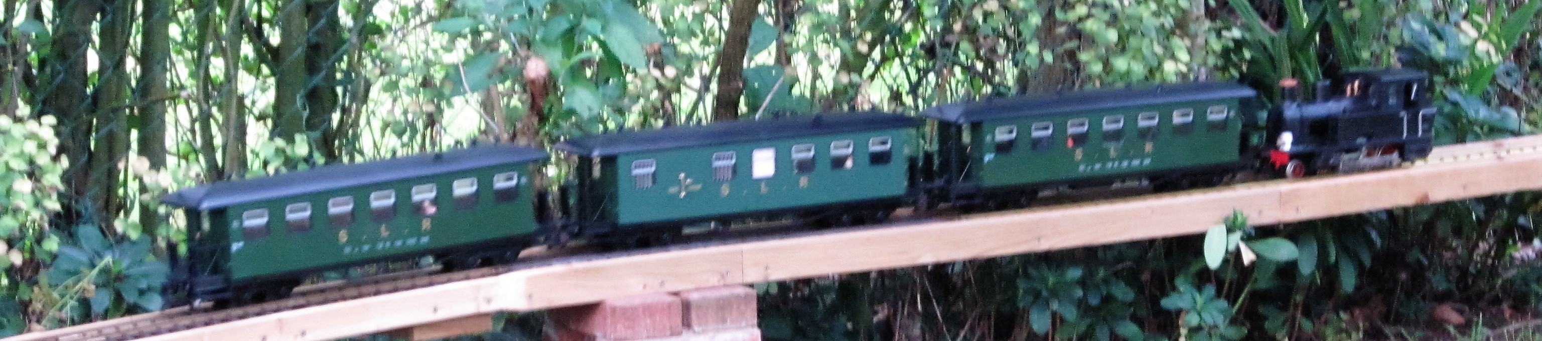 NQD coach conversion - Brake end and toilet compartment. Rake also now has metal wheel-sets and Piko electric couplings for LED interior and tail lights powered from 9v battery under centre coach