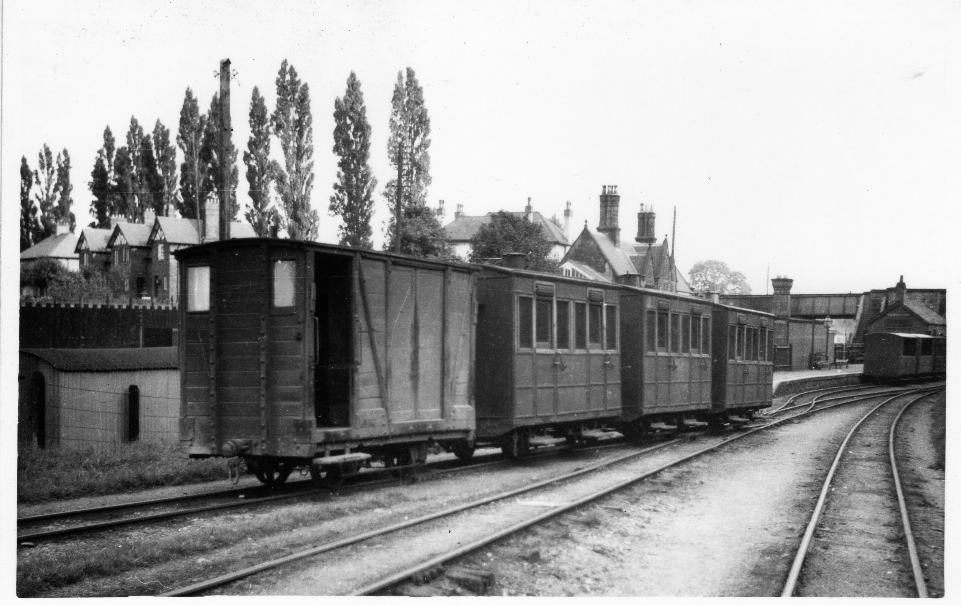 NGRS Collection 3 Glyn Valley Tramway 4-wheel closed carriages and brake van at Chirk Station.jpg