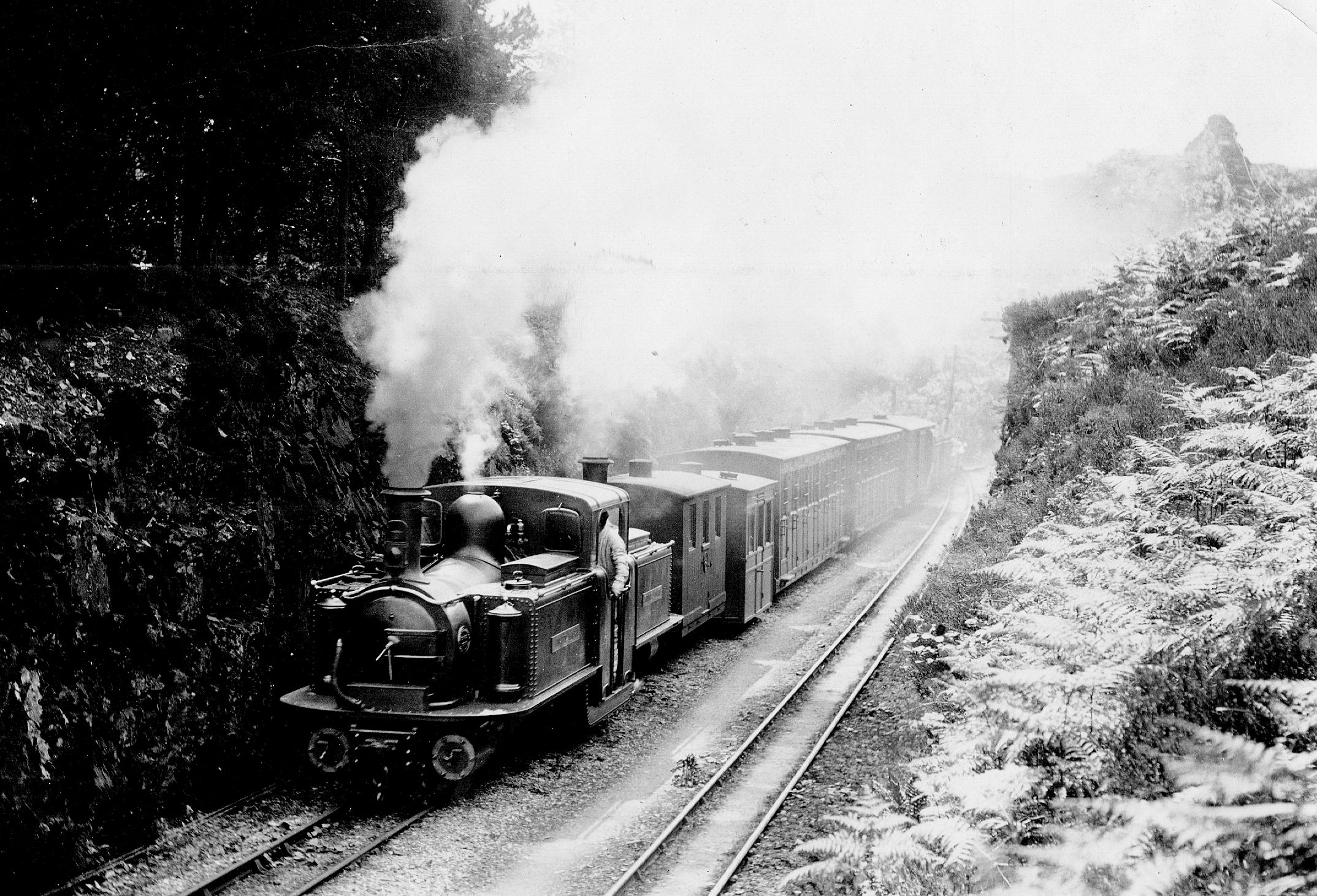 NGRS Collection 3 Ffestiniog Railway Double Fairlie loco with passenger train in cutting.jpg