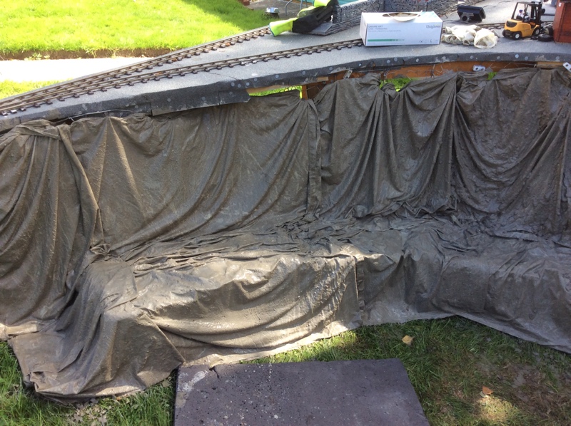 Bed sheets been soaked in cement soup with some sand added