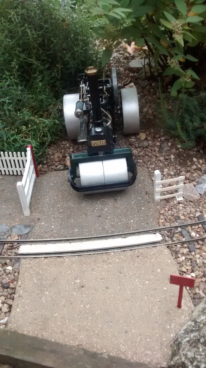 The roller on the road. The road will be extended out behind where the roller is