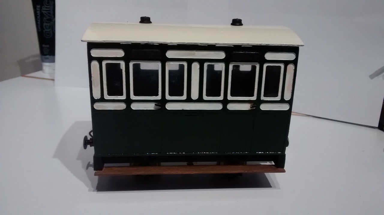 This is one of my original coaches. They would all of been painted this way if they would of had small panels above and below the windows that could of been painted white ( it looks wrong without)