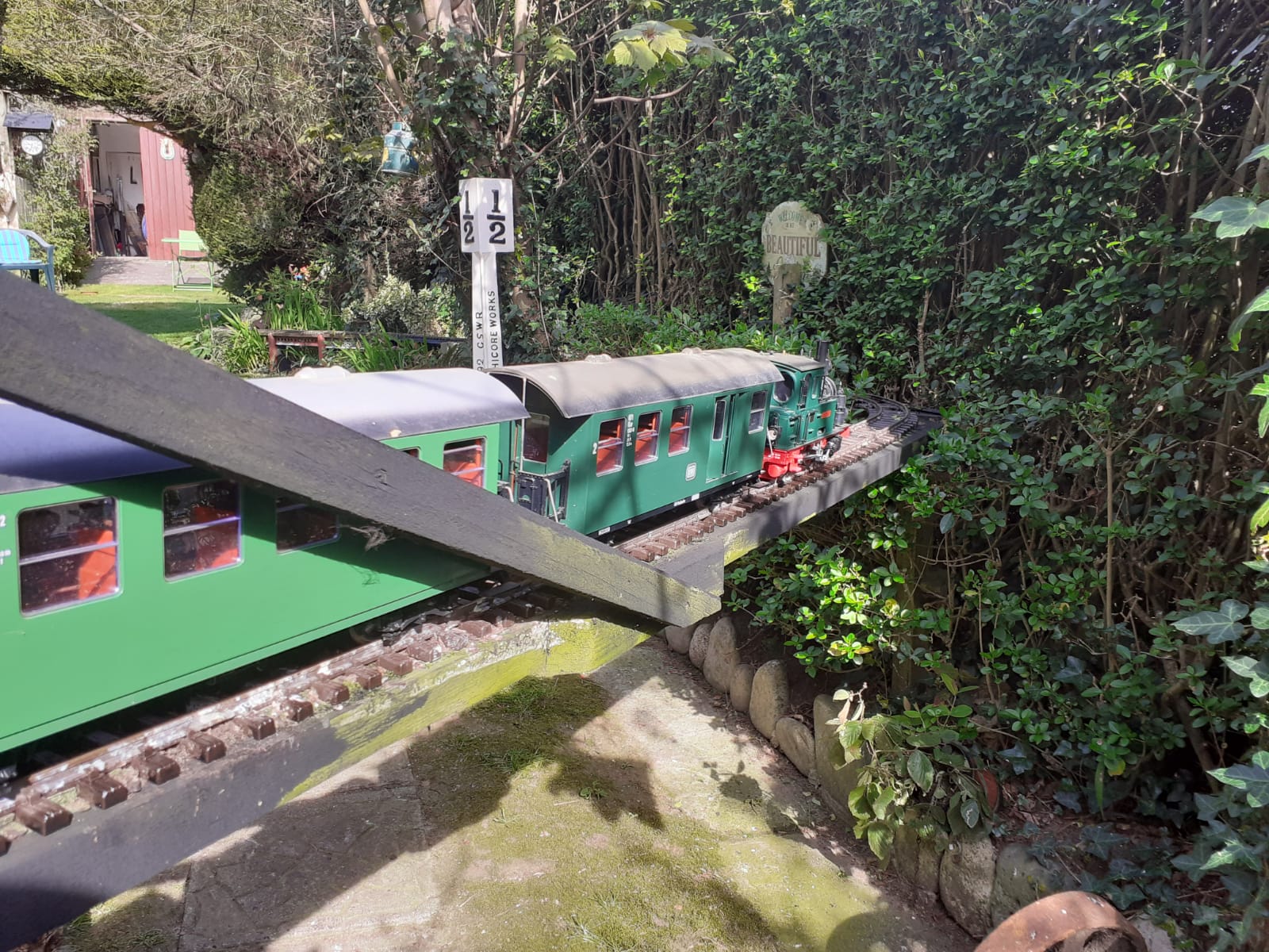 LGB Spreewald crosses the swing bridge with a service to Derrylecka. The bridge is on hinges and locks in place when running