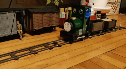 Pulling two wagons, one loaded.