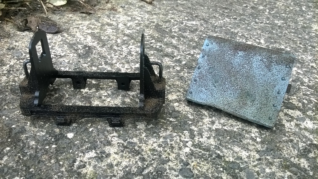 Painted skip with rust powder.jpg